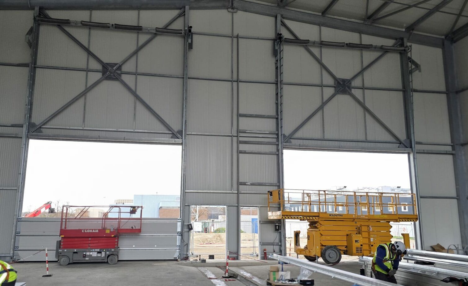 portes sectionnelles industrielles avec levée verticale